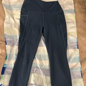 Women’s RBX blue leggings with pockets size M